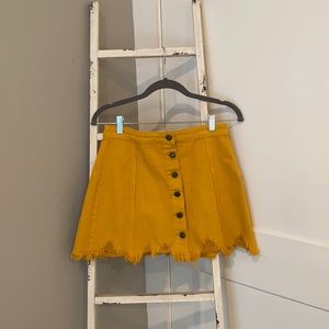 gold mini skirt
